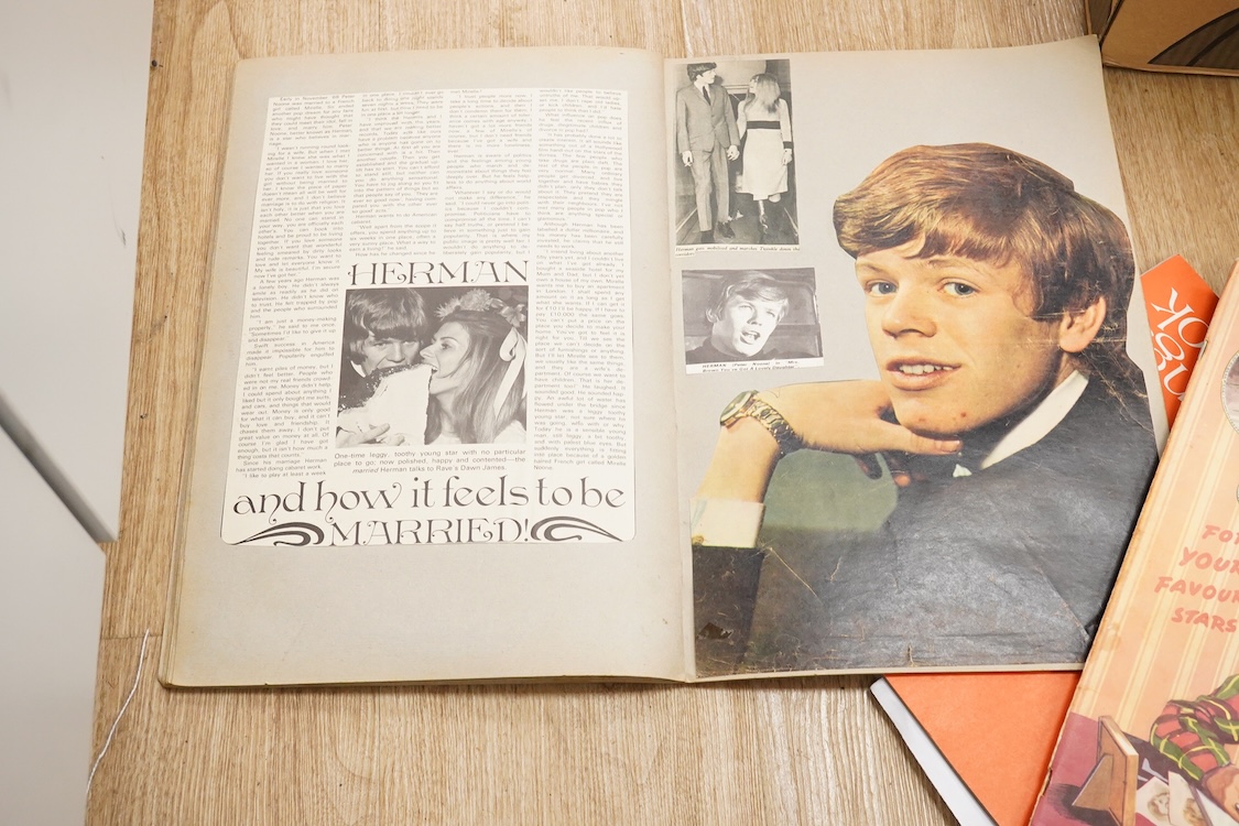 A collection of original 1960s pop memorabilia including The Beatles related items; a pair of Beatles curtains together with some spare material, a brooch on its original backing card, and a number of magazines, a 1979 W